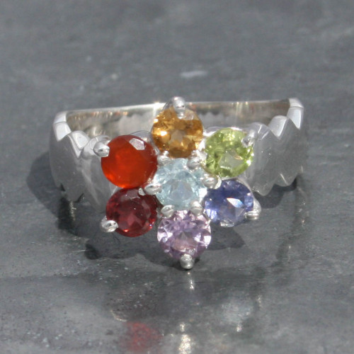 Chakra faceted ring with wave front